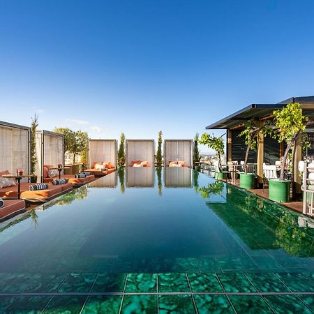 Bless Hotel Madrid - The Leading Hotels Of The World Экстерьер фото The rooftop pool at the hotel